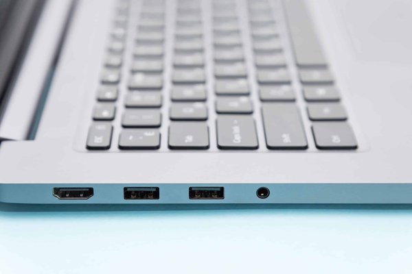 How to legally handle the transfer of business licenses in a UK company acquisition?